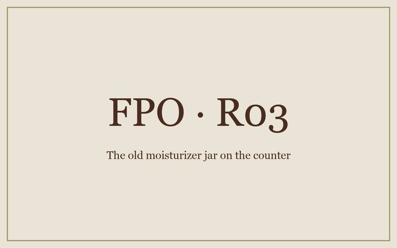 FPO: the old moisturizer jar, nearly empty, on a bathroom counter.