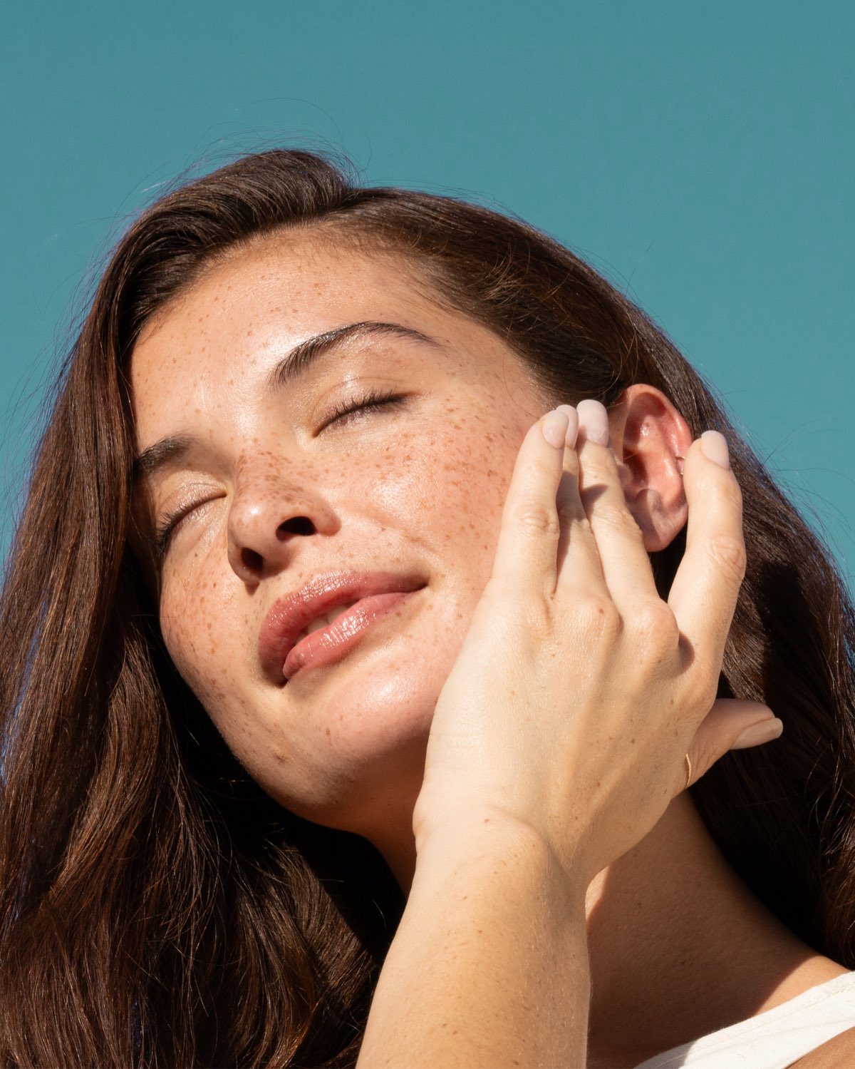 Woman with glowing, healthy skin — Bambu Earth natural skincare