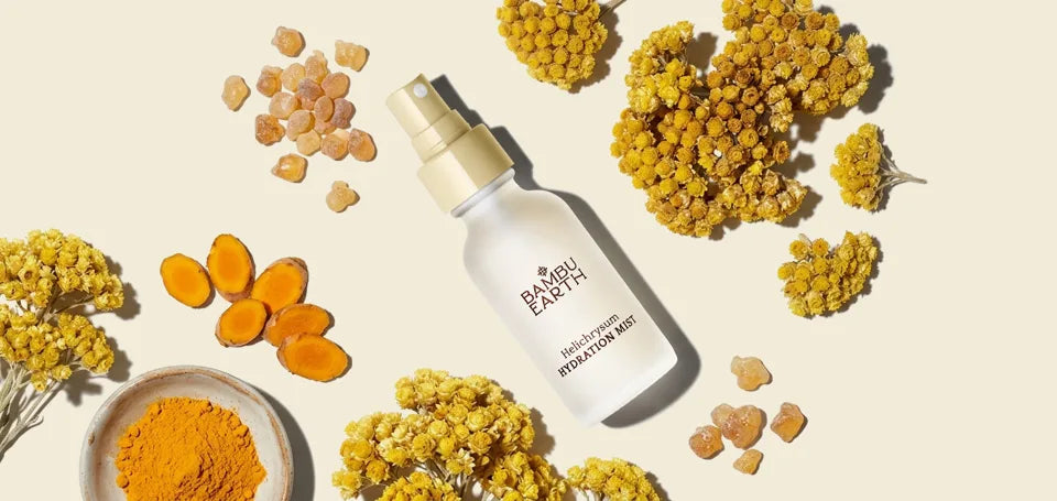 Helichrysum Hydration Mist bottle with helichrysum flowers, turmeric, and frankincense resin
